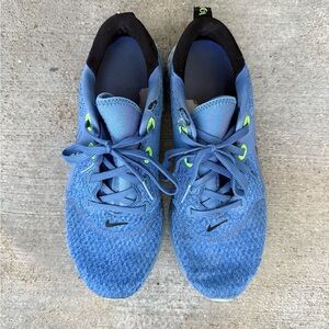 Nike Light Blue Running Shoes with Neon Accents